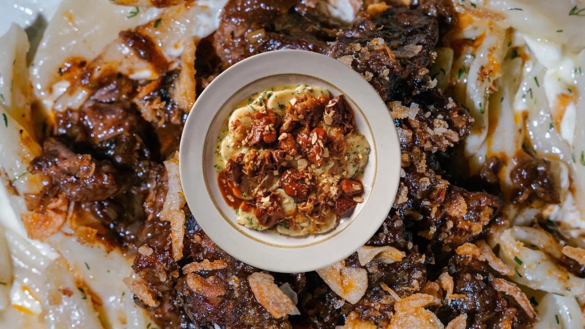 Poltava halushky with chicken liver: a plate in the centre and close-up views on both sides